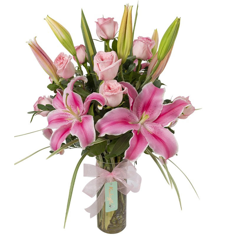 Arrangement of lilies and garden roses in a vase