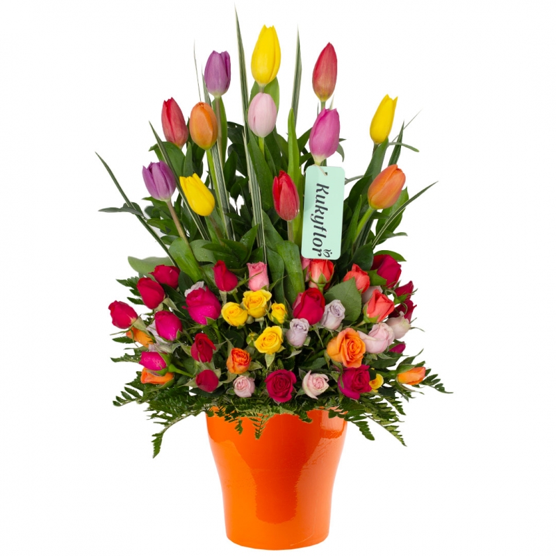 Arrangement of 12 tulips and mini roses on a ceramic base