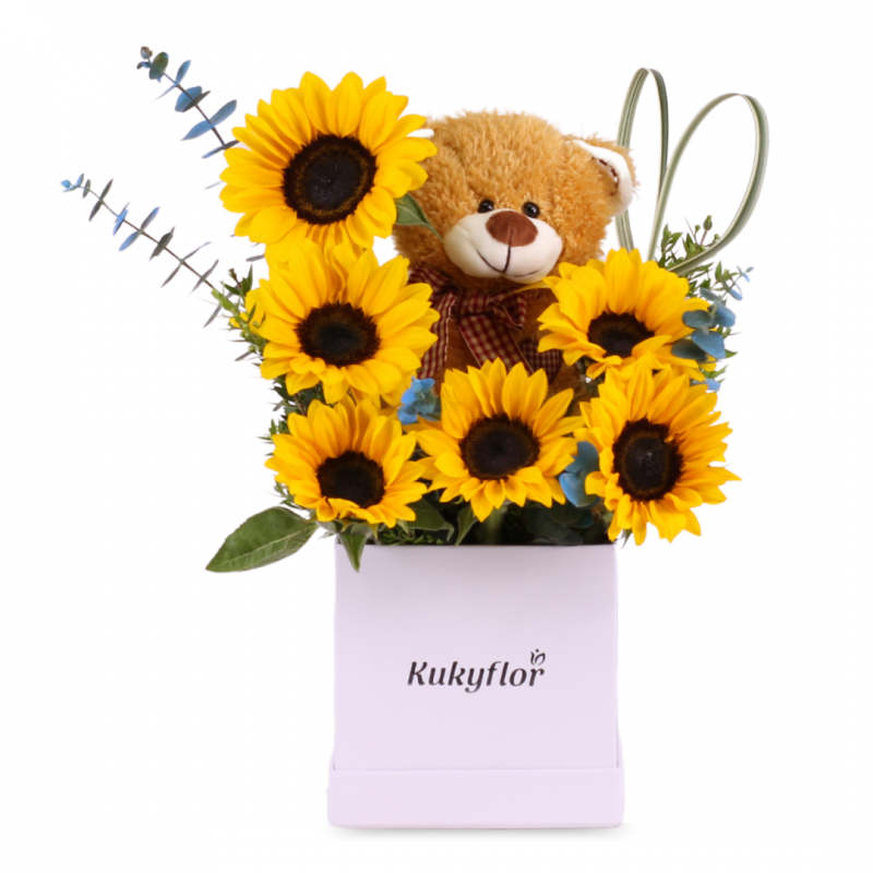 Box of sunflowers with stuffed animal