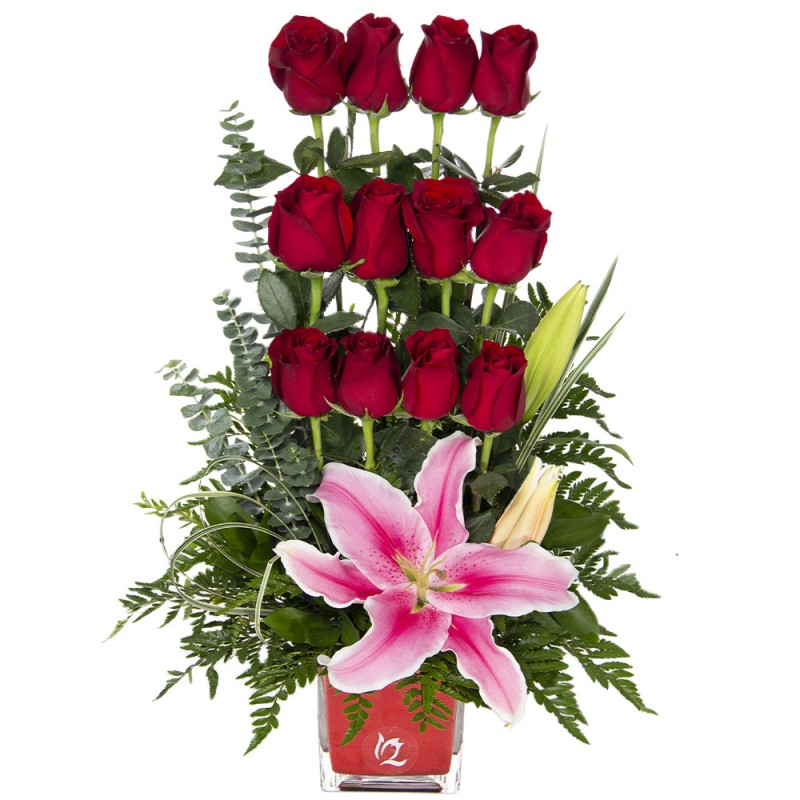 Arrangement of 12 red roses and scented lilies on a glass base D